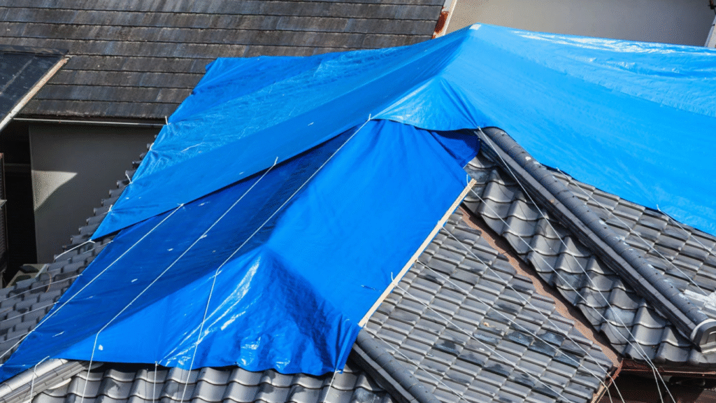 Emergency roof repair &mdash; tarpaulin and temporary fix