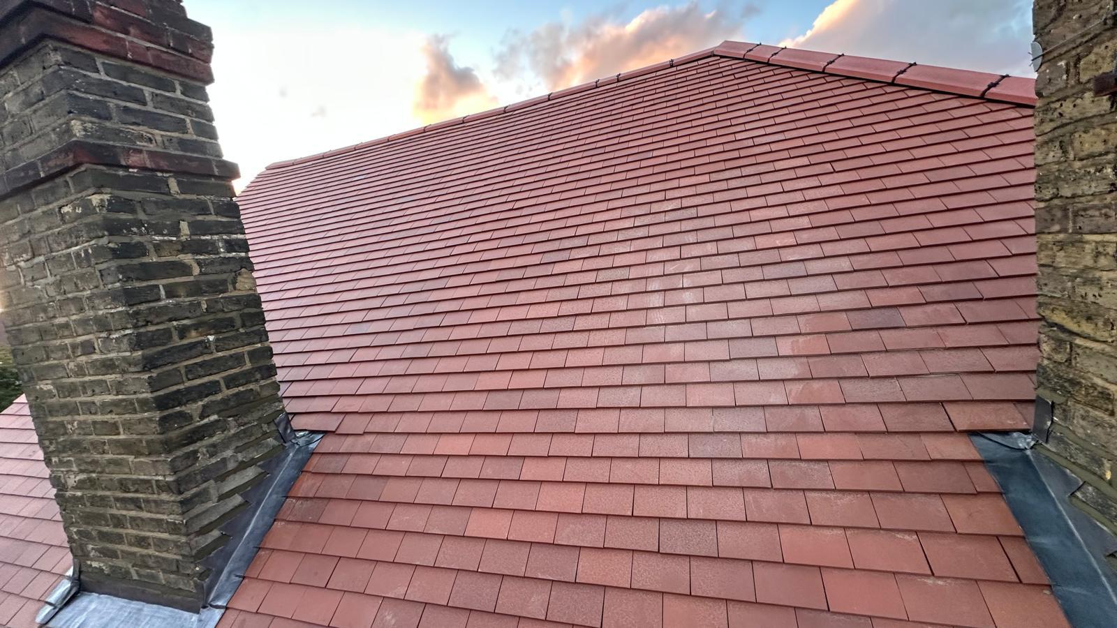 Partial chimney stack rebuild with matching bricks