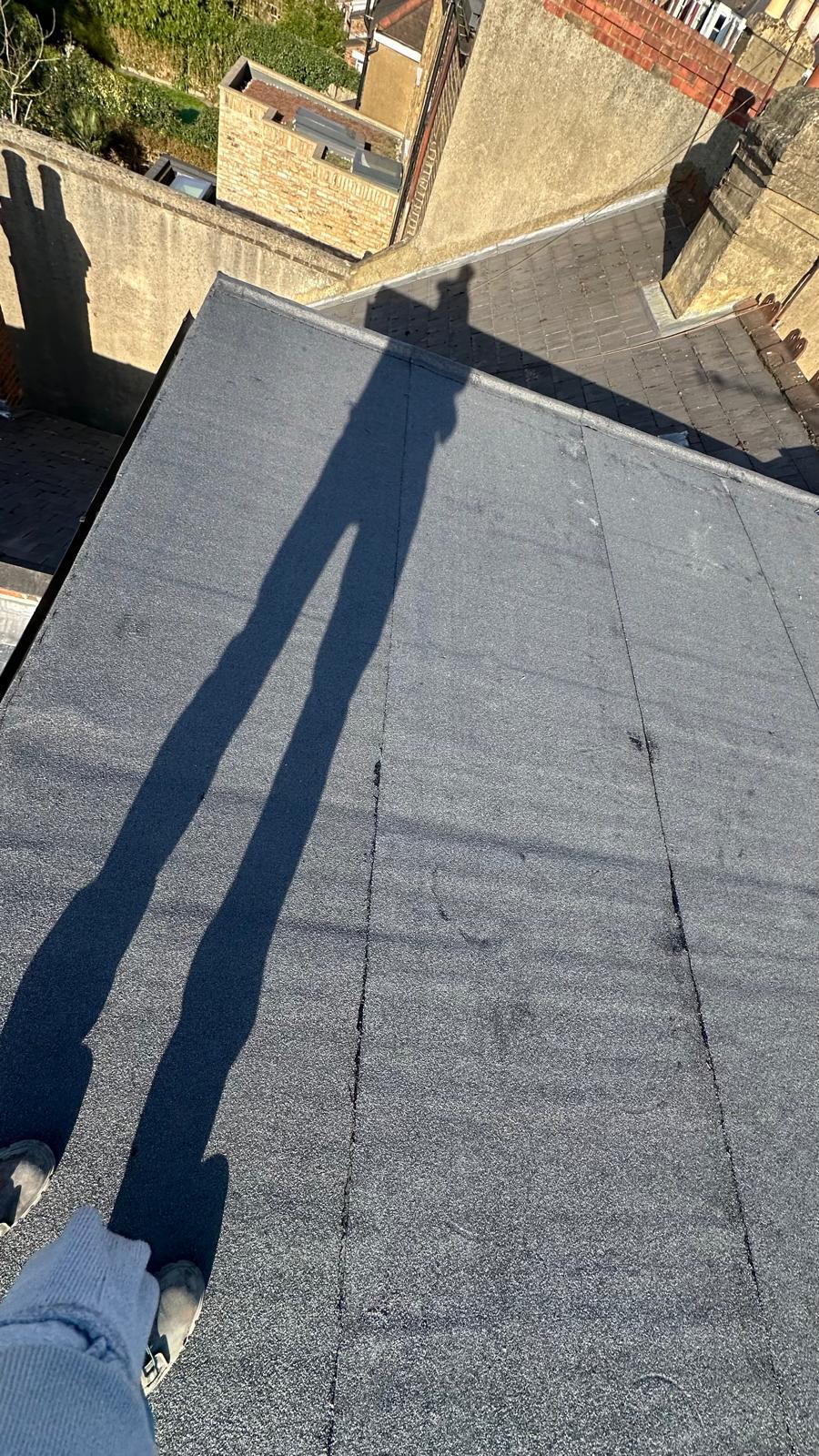 EPDM flat roof installation on extension