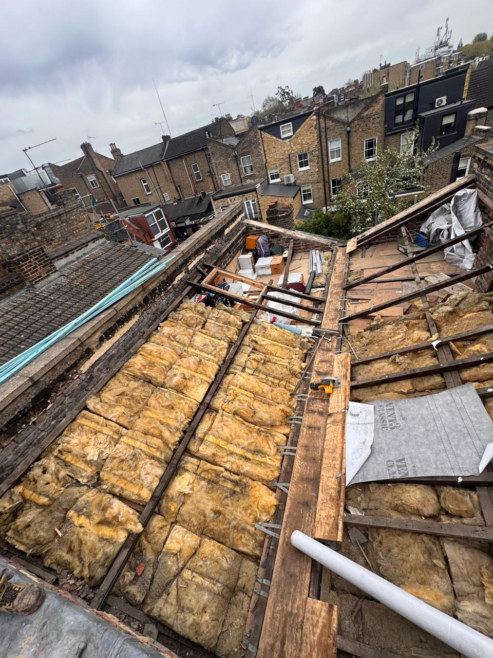 Insulation between roof joists